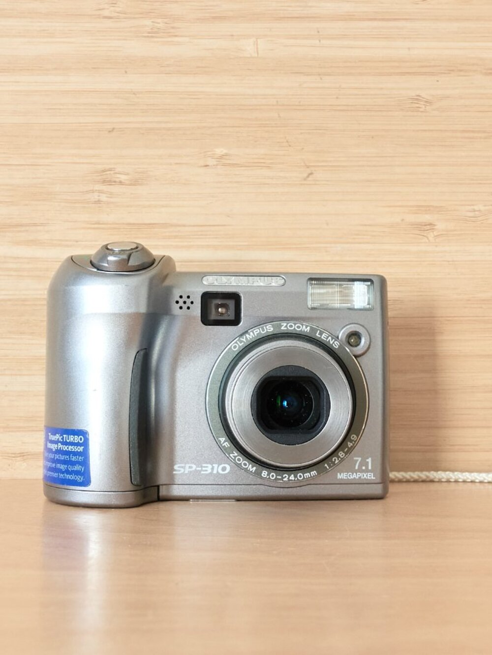 OLYMPUS SP-310 7.1MP Digital Camera, 3x Optical Zoom, Silver